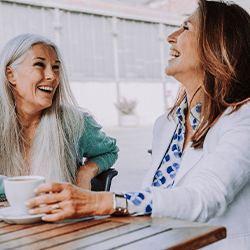 Ladies converse over coffee