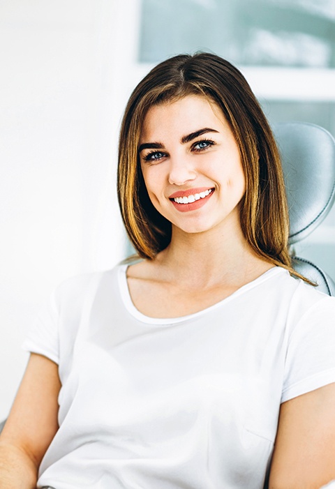 a closeup of a dental patient smiling 